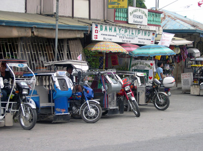 Tricycles, Puerto Galera ›
  February 2004.